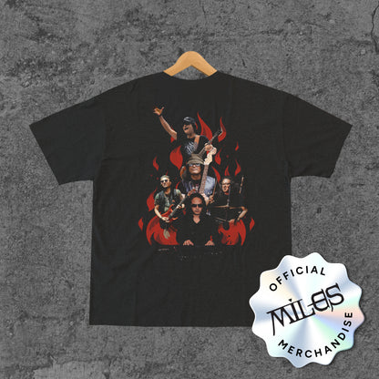 Black t-shirt with a graphic of a band on a textured gray background